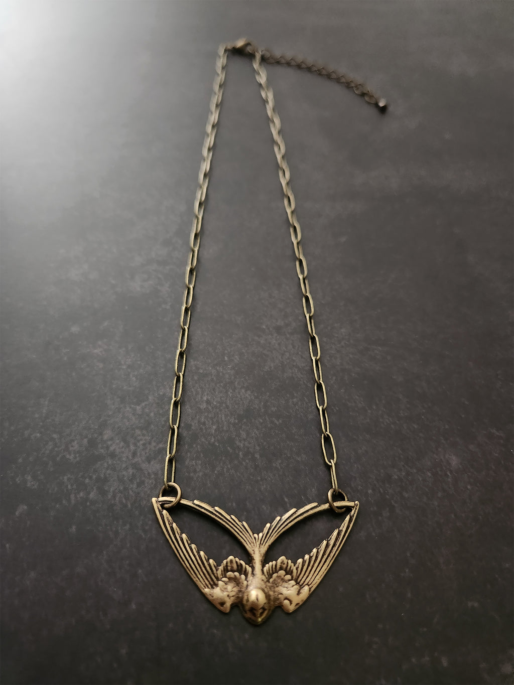 geo swallow necklace
