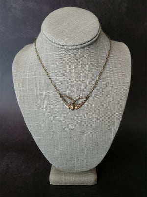 geo swallow necklace