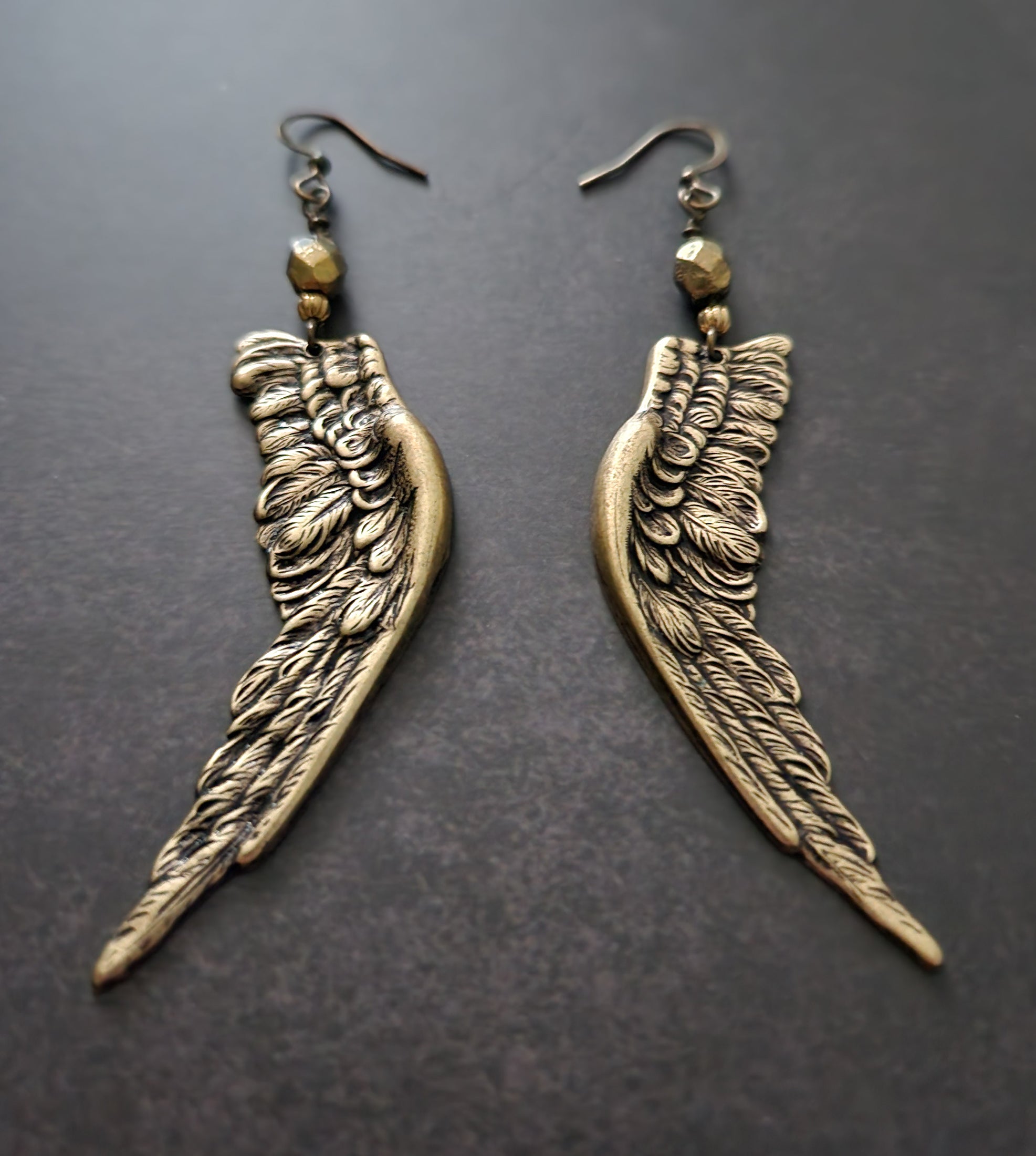 golden angel wing earrings