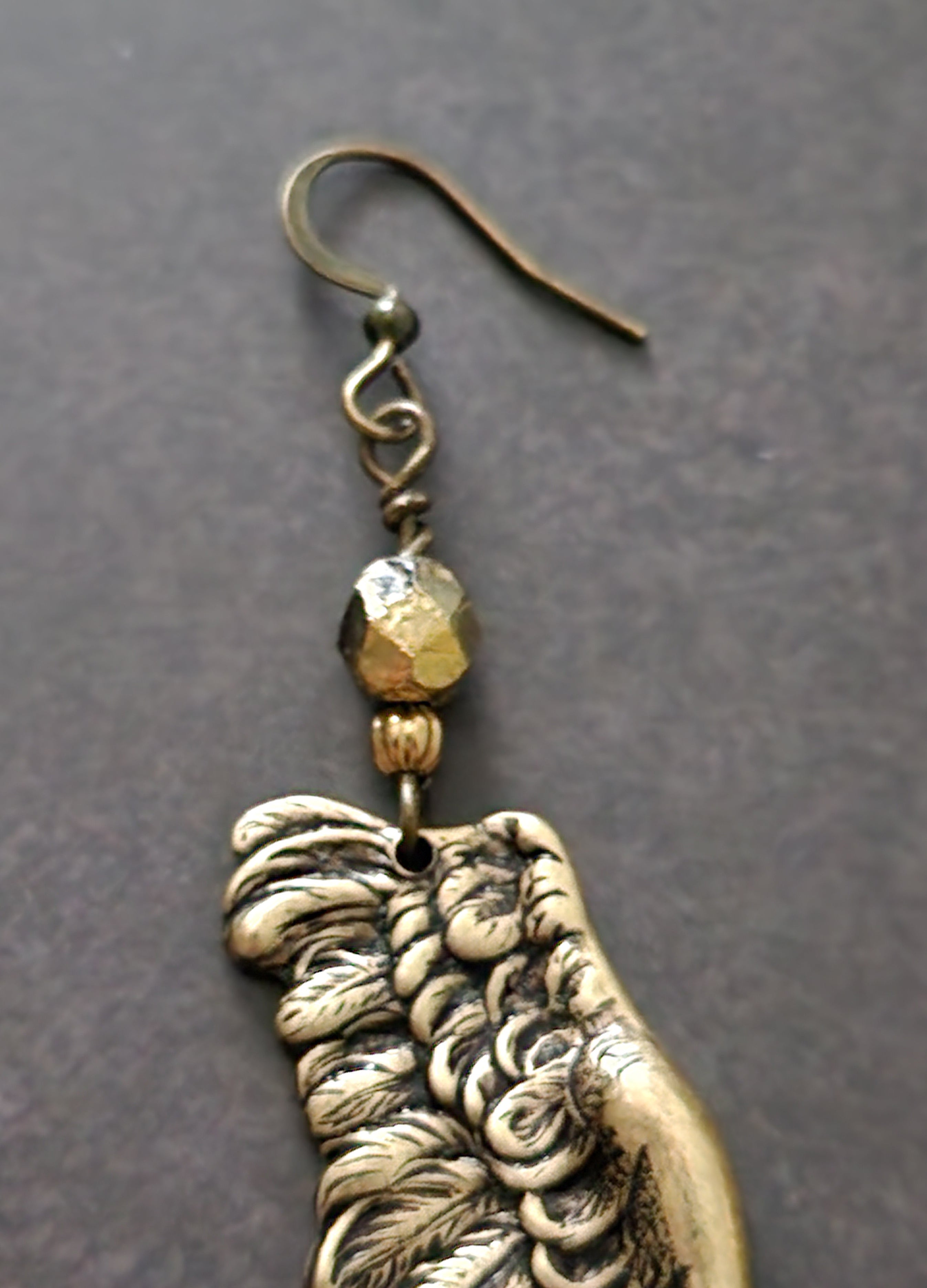 golden angel wing earrings