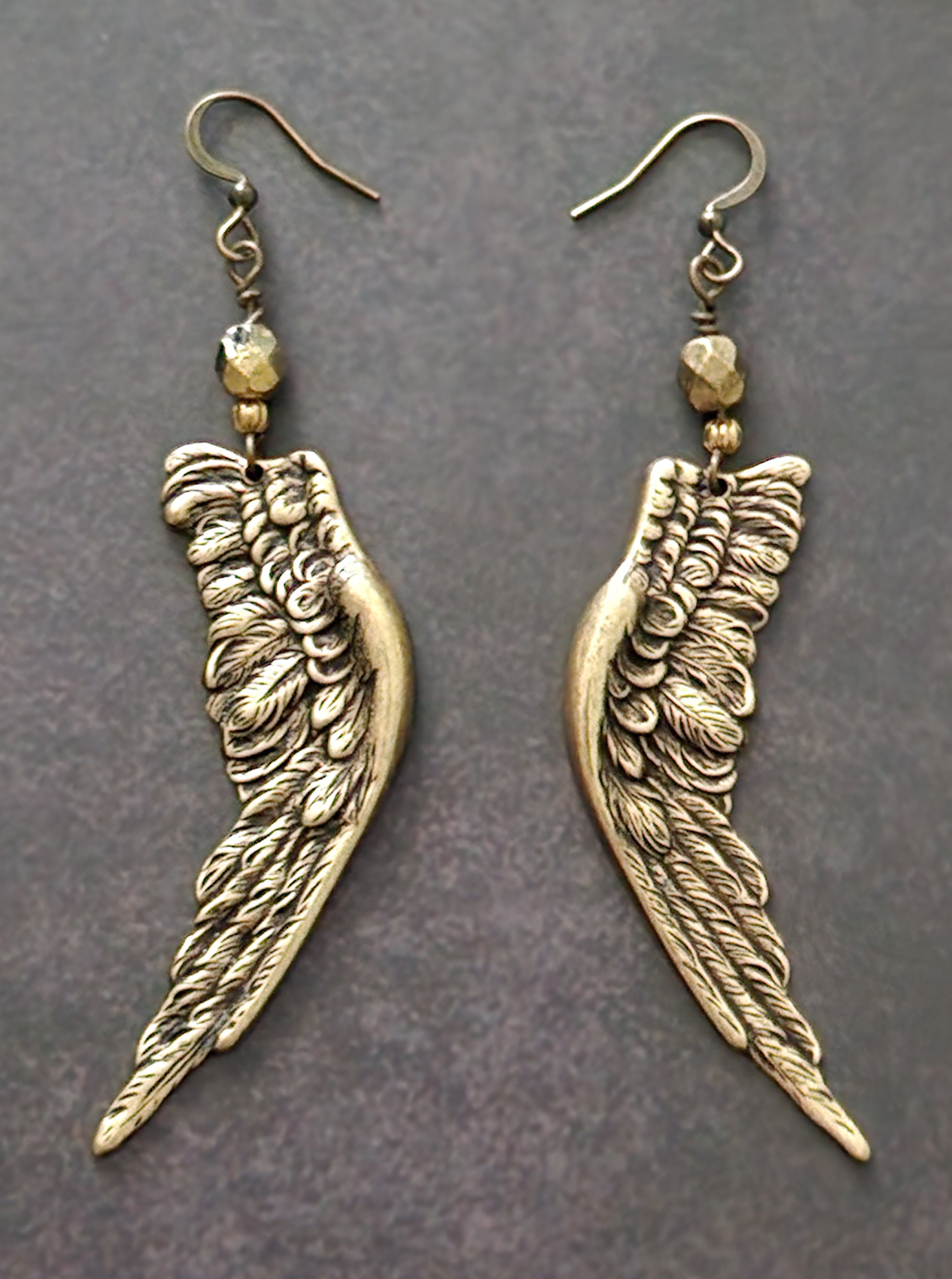 golden angel wing earrings