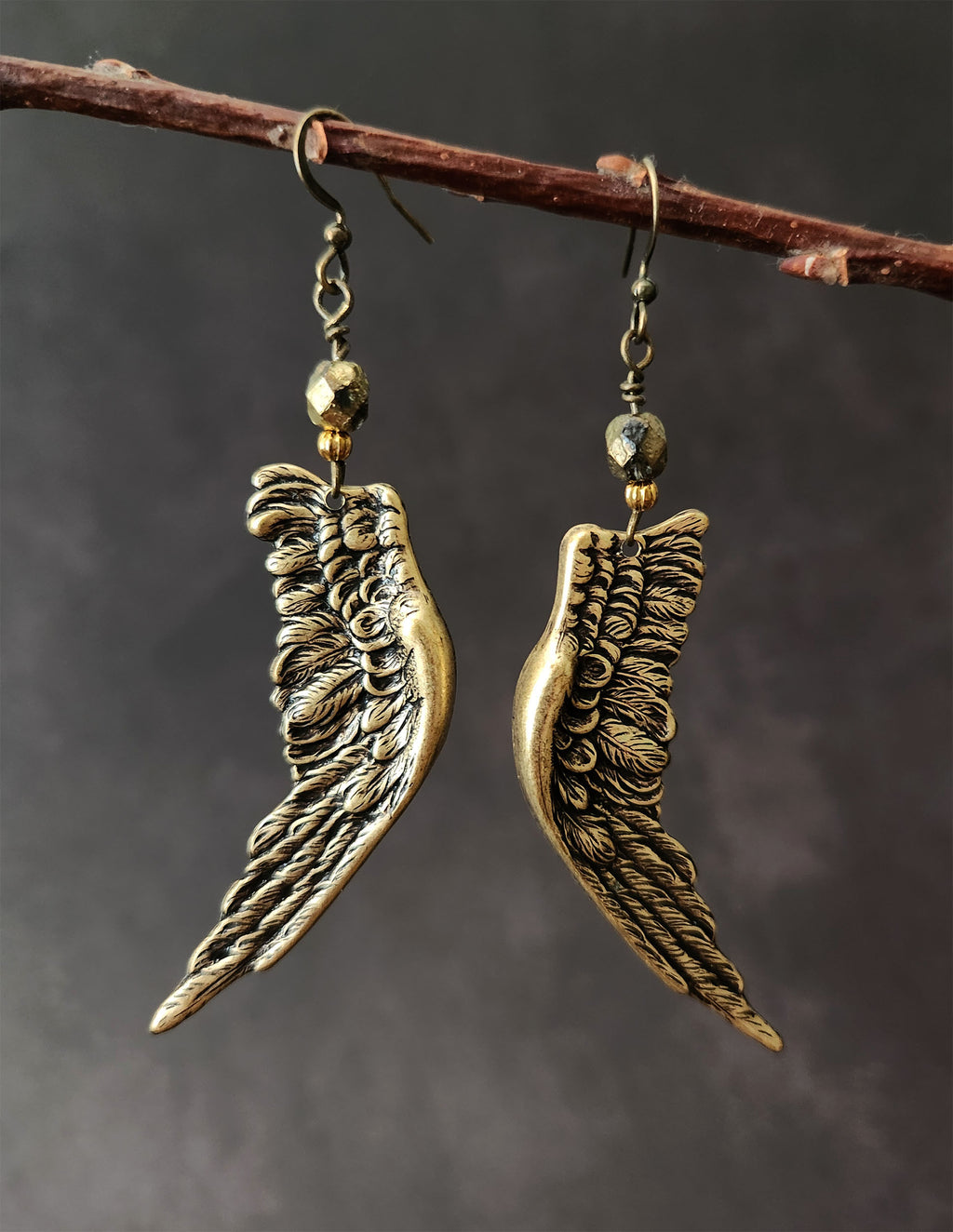 golden angel wing earrings